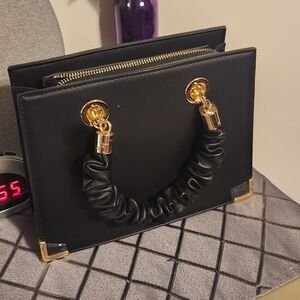 Aldo Black Clutch with Gold Details